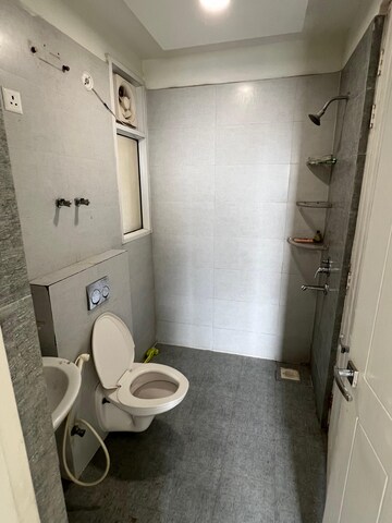 Bathroom in 2.5 BHK Apartment at Antriksh Golf View, Sector 78 – for Rent