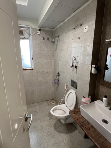 Bathroom in 2.5 BHK Apartment at Antriksh Golf View, Sector 78 – for Rent