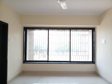 Room in 2 BHK Apartment at Royal Classic Co Op Society, Andheri West – for Rent