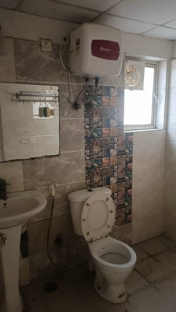 Bathroom in 3 BHK Apartment at Amrapali Silicon City, Sector 76 – for Rent