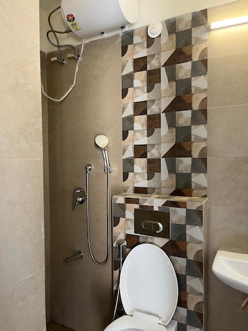 Bathroom in 1.5 BHK Apartment at Ajmera Greenfinity, Wadala East – for Rent