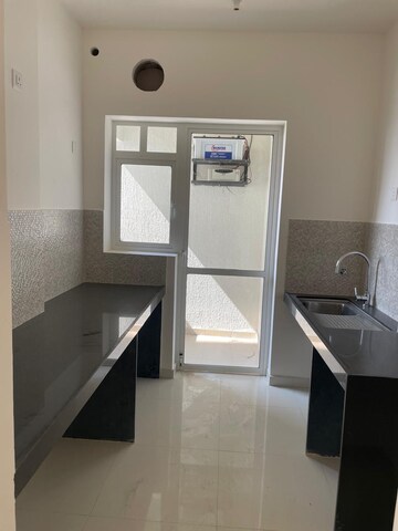 Kitchen in 2 BHK Apartment at Godrej Nurture Pune, Mamurdi – for Rent