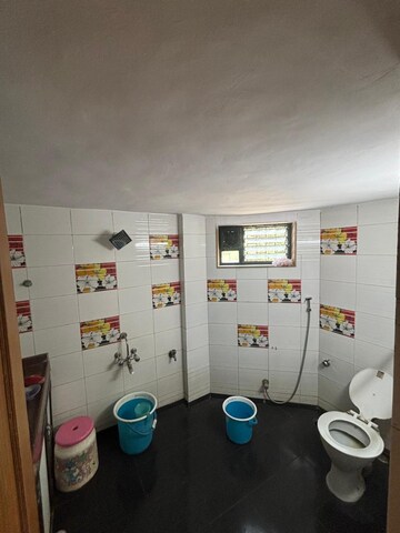 Bathroom in 4 BHK Apartment at Jimmy Tower Apartment, Kopar Khairane – for Sale