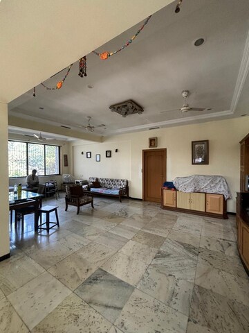 Living Room in 4 BHK Apartment at Jimmy Tower Apartment, Kopar Khairane – for Sale