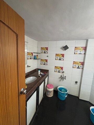 Bathroom in 4 BHK Apartment at Jimmy Tower Apartment, Kopar Khairane – for Sale
