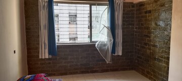 Master Bedroom in 1 BHK Apartment at Pratha Pushpa Society, Ghodbunder Road – for Sale