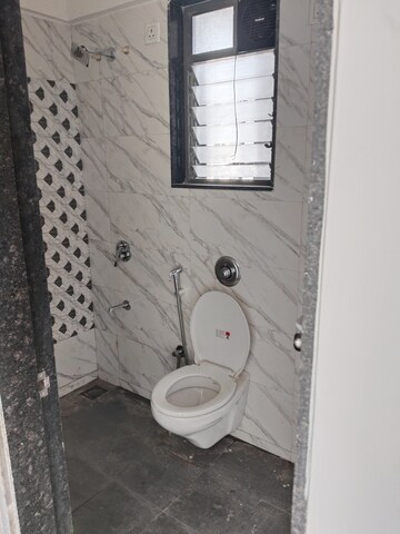 Bathroom in 1 BHK Apartment at UK Luxecity, Kandivali East – for Rent