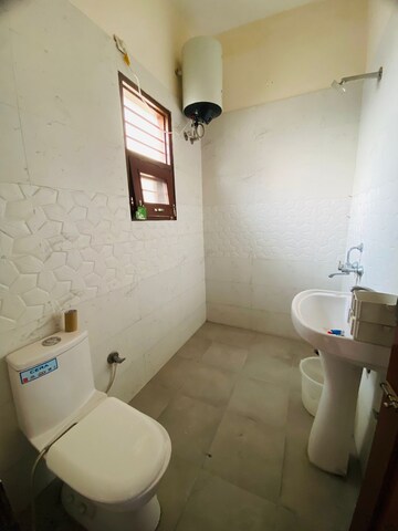 Bathroom in 2 BHK Apartment at Sunny Enclave – for Rent