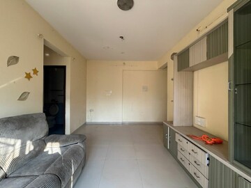 Living Room in 1 BHK Apartment at Suncity Complex, Powai – for Sale