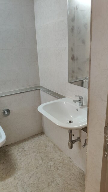 Bathroom in 1 BHK Apartment at Godrej Nest Kandivali, Kandivali East – for Rent