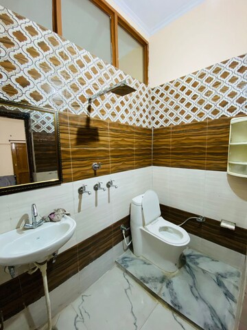 Bathroom in 2 BHK Apartment at Sunny Enclave – for Rent
