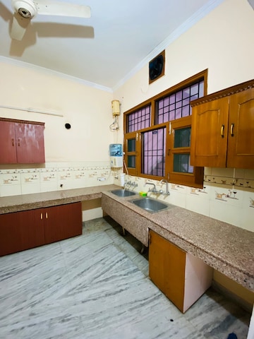 Kitchen in 2 BHK Apartment at Sunny Enclave – for Rent
