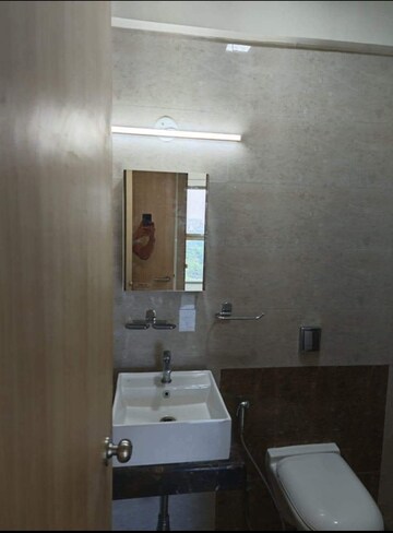 Bathroom in 2 BHK Apartment at Rajesh Raj Infinia, Malad West – for Rent