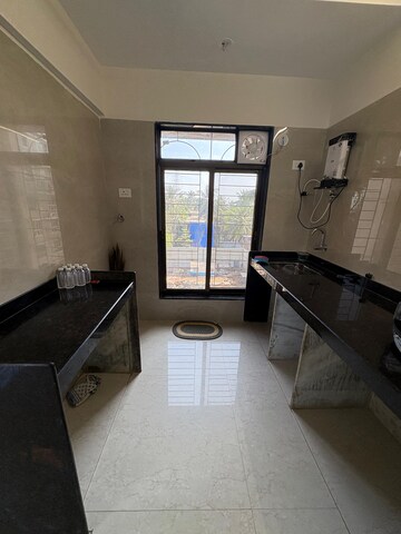 Kitchen in 2 BHK Apartment at Mahindra Vicino, Andheri East – for Rent
