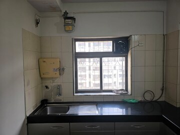 Kitchen in 2 BHK Apartment at Golden Square, Santacruz East – for Rent