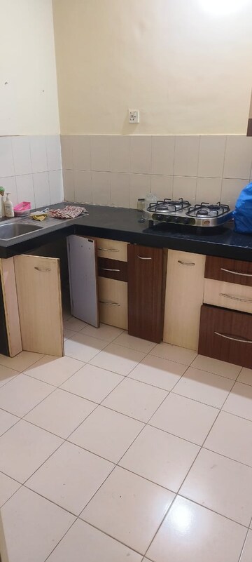 Kitchen in 2 BHK Apartment at Shlok CHS Moshi, Moshi – for Rent