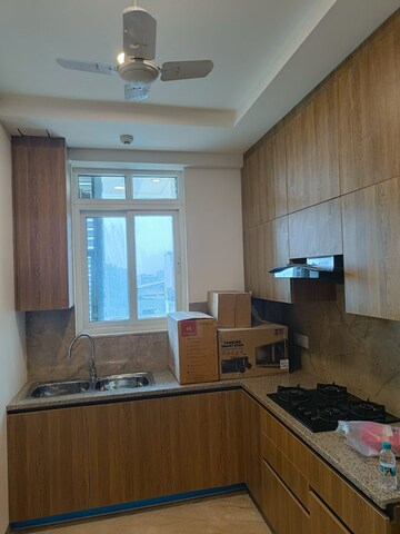 Kitchen in 4 BHK Apartment at Ambience Creacions, Sector 22 – for Rent