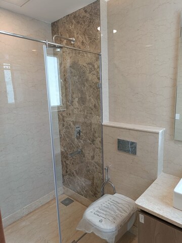 Bathroom in 4 BHK Apartment at Ambience Creacions, Sector 22 – for Rent
