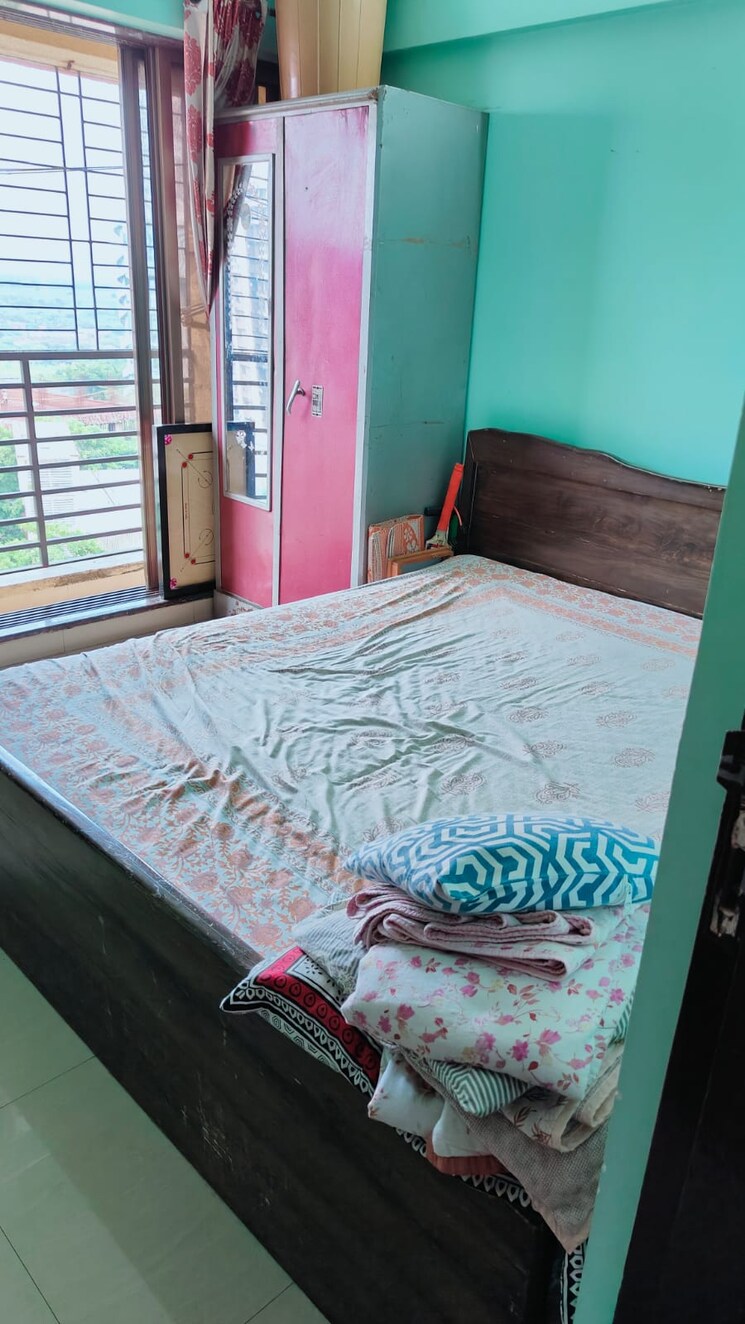 Bedroom, unnathi-woods-phase-1-and-2 1 Bedroom 400 Sq.Ft. Apartment In Ghodbunder Road Thane 7973085