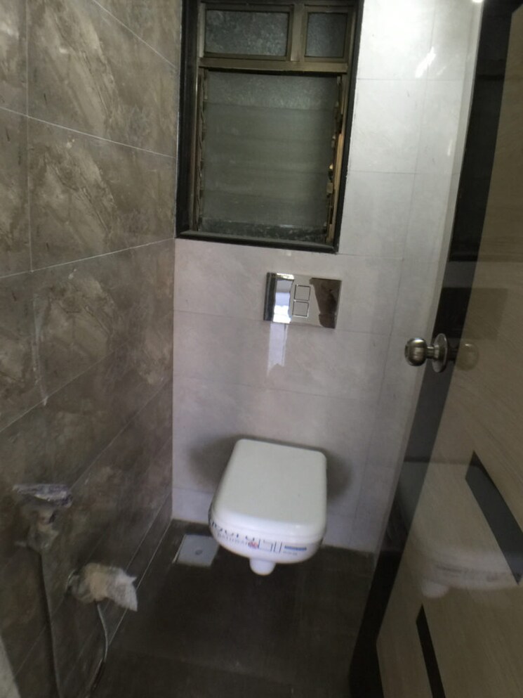 Bathroom, rna-n-g-silver-spring 3 Bedroom 987 Sq.Ft. Apartment In Mira Road Thane 7973174