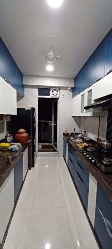 Kitchen in 3 BHK Apartment at Hiranandani Buttercup, Manpada – for Rent
