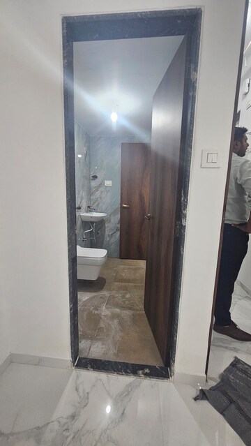 Kitchen in 2 BHK Apartment at Pramanik Walchand Paradise, Mira Road – for Sale