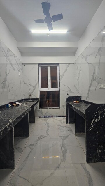 Kitchen in 2 BHK Apartment at Pramanik Walchand Paradise, Mira Road – for Sale