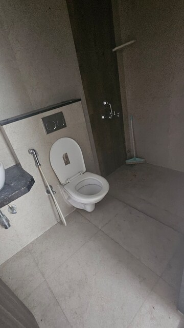 Bathroom in 2 BHK Apartment at Unique Signature Mumbai, Mira Road – for Rent