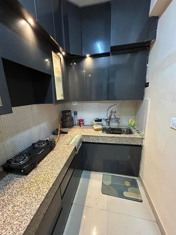 Kitchen in 2 BHK Apartment at Supertech Ecovillage II, Sector 16b Greater Noida – for Sale
