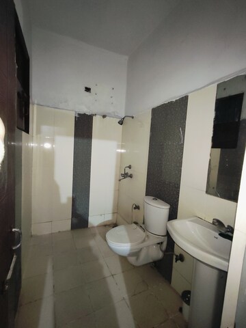 Bathroom in 2 BHK Apartment at Dhakoli Village – for Sale