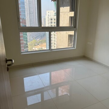 Room in 2 BHK Apartment at Wadhwa Atmosphere O2, Nahur Gaothan – for Sale