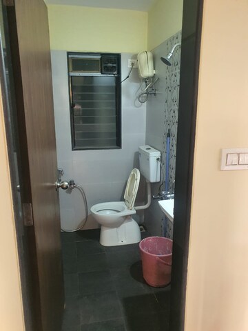 Bathroom in 1.5 BHK Apartment at Tilak Indrayani, Tilak Nagar – for Rent