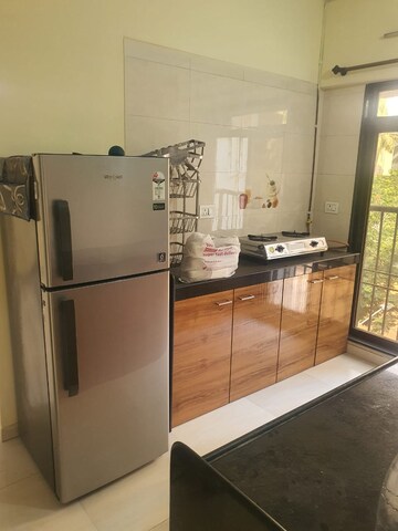 Kitchen in 1.5 BHK Apartment at Tilak Indrayani, Tilak Nagar – for Rent