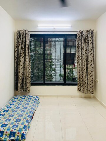 Bedroom in 1 BHK Apartment at Kalpana CHS Tilak Nagar, Tilak Nagar – for Rent