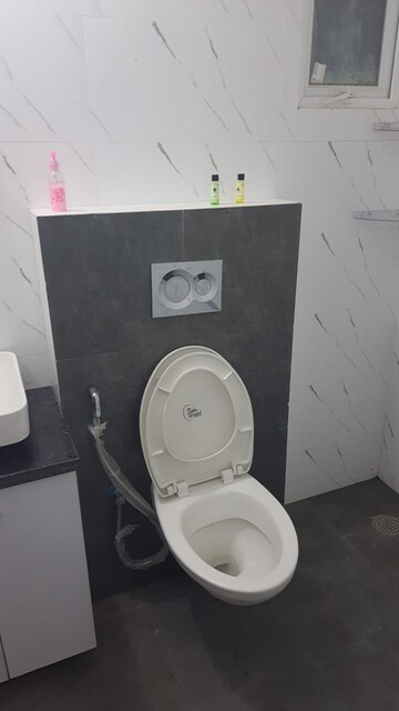 Bathroom in 4 BHK Apartment at Paradigm Business Hermitage Park, Dhakoli Village – for Rent