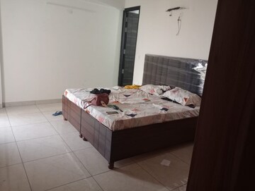 Bedroom in 4 BHK Apartment at Paradigm Business Hermitage Park, Dhakoli Village – for Rent
