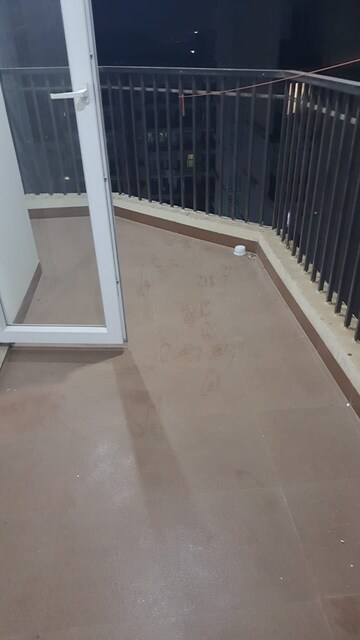Balcony in 4 BHK Apartment at Paradigm Business Hermitage Park, Dhakoli Village – for Rent