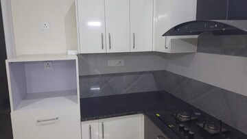 Kitchen in 4 BHK Apartment at Paradigm Business Hermitage Park, Dhakoli Village – for Rent