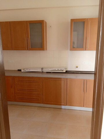 Kitchen in 3 BHK Apartment at Sandwoods Spangle Heights, Dhakoli Village – for Rent