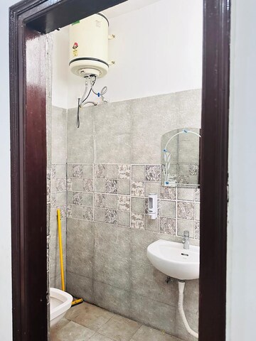 Bathroom in 3 BHK Apartment at Fortune Victoria Heights, Dhakoli Village – for Rent