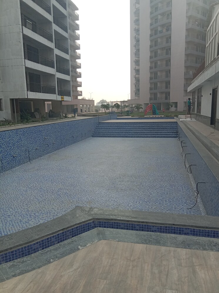Swimming Pool, cosmos-express-99 3 Bedroom 1865 Sq.Ft. Apartment In Sector 99 Gurgaon 7973688