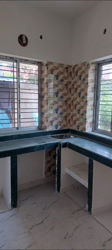 Kitchen in 2 BHK Apartment at City Apartments, Behala – for Sale