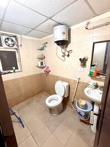 Bathroom in 3 BHK Apartment at Aims Golf City, Sector 75 – for Rent