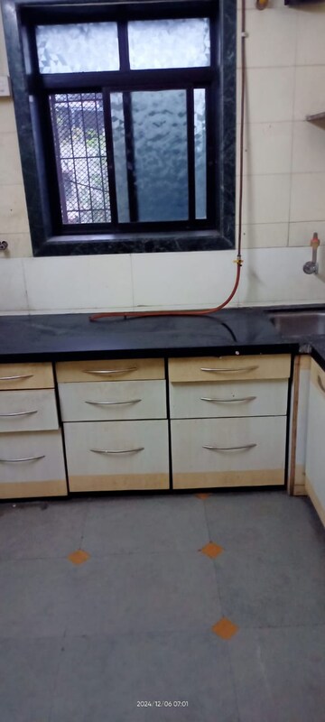 Kitchen in 1 BHK Apartment at Sai Om CHS, Louis Wadi – for Rent