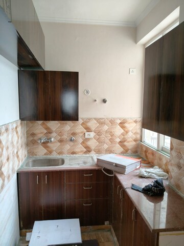 Kitchen in 2.5 BHK Apartment at Amrapali Golf Homes, Sector 4, Greater Noida – for Rent