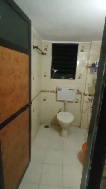 Bathroom in 2 BHK Apartment at Yashwant Arcade, Kopar Khairane – for Rent