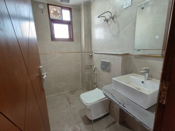 Bathroom in 3 BHK Builder Floor at Chattarpur – for Sale
