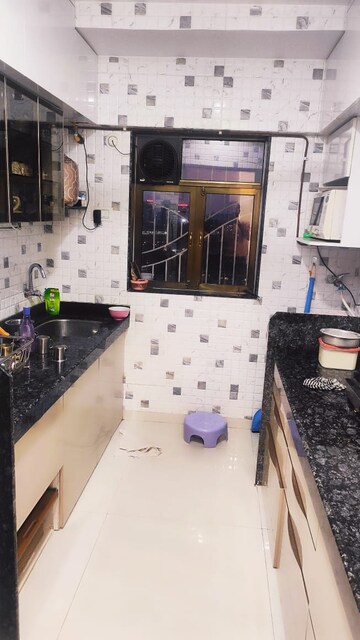 Kitchen in 1 BHK Apartment at Harshal Devchhaya, Dahisar East – for Sale
