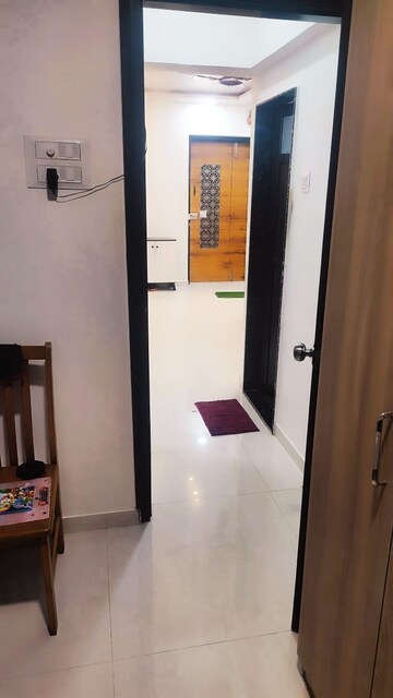 Building Lobby in 1 BHK Apartment at Harshal Devchhaya, Dahisar East – for Sale