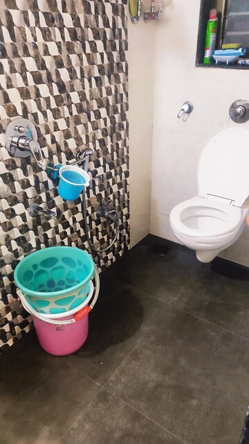 Bathroom in 1 BHK Apartment at Harshal Devchhaya, Dahisar East – for Sale